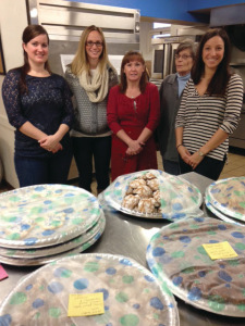 Junior League of Syracuse members bake cookies for Assumption Food Pantry, December 2013